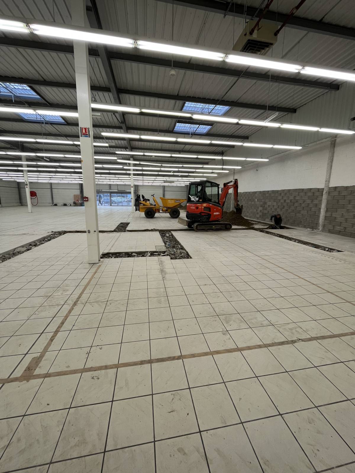 Pro inter Wittenheim : démolision, ouverture de tranchées, assainissement, enrobé , caniveau inox , dallage, béton Saverne 1